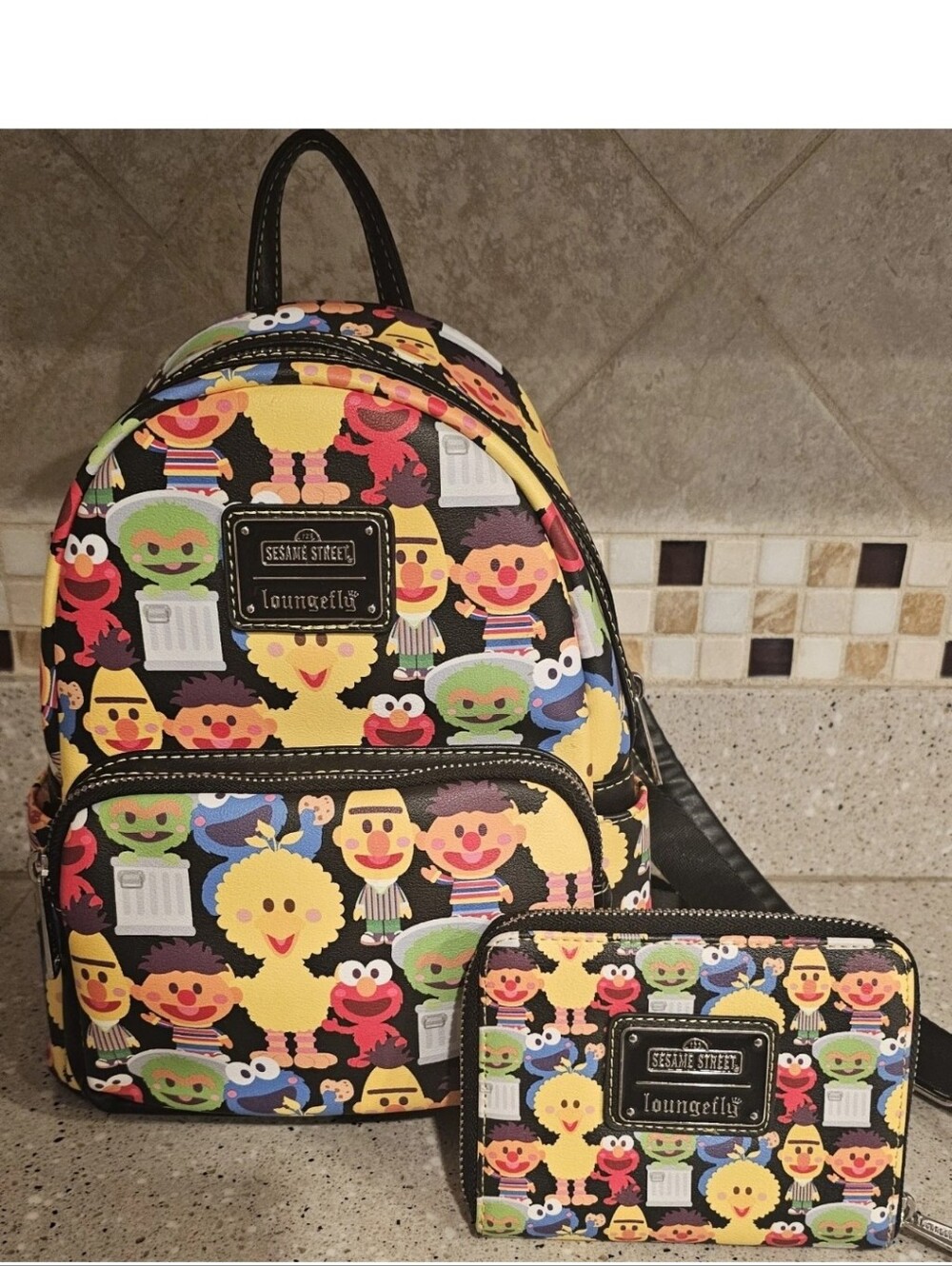 Loungefly Sesame Street all-over print mini backpack and matching wallet